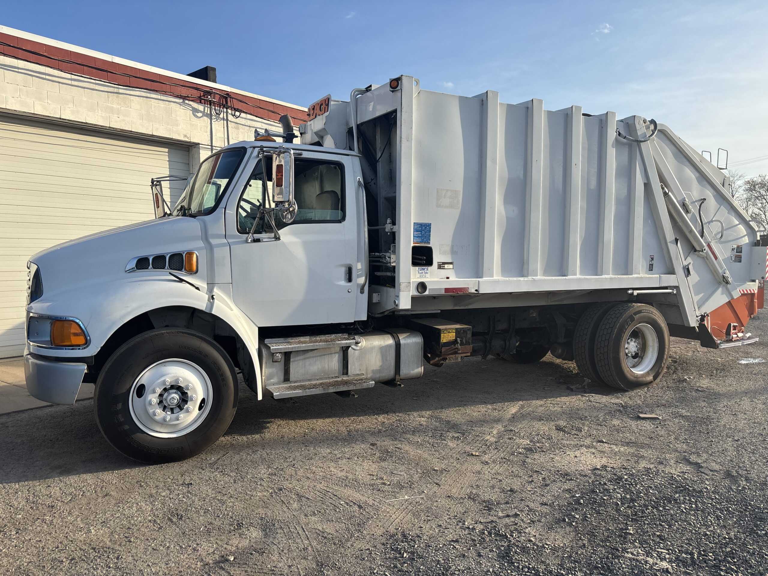 OZ Waste trash truck in service